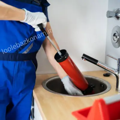 لوله بازکنی اوین 7 لوله بازکنی اوین، متخصص در حال باز کردن گرفتگی لوله