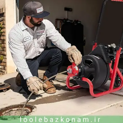 لوله بازکنی کیاشهر 7 لوله بازکن در کیاشهر در حال باز کردن گرفتگی لوله با دستگاه و فنر