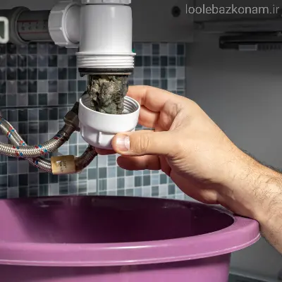رفع گرفتگی سینک ظرفشویی 2 علت بالا آمدن آب از سینک ظرفشویی